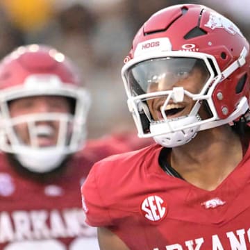 Arkansas Razorbacks quarterback Taylen Green celebrates a touchdown against UAPB at War Memorial Stadium in Little Rock, Ark.,