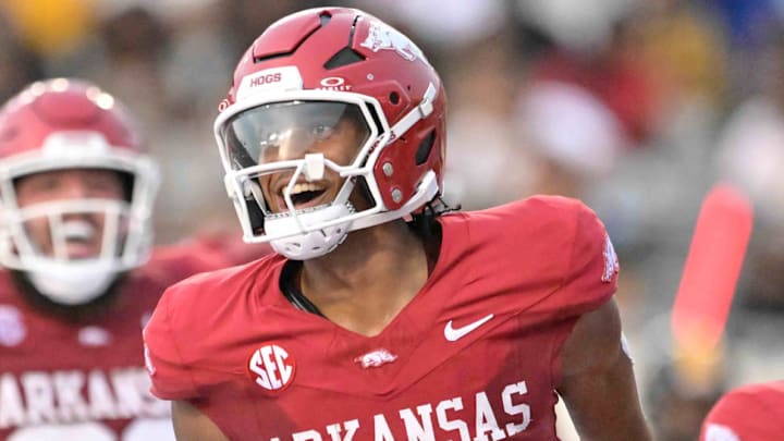 Arkansas Razorbacks quarterback Taylen Green celebrates a touchdown against UAPB at War Memorial Stadium in Little Rock, Ark.,