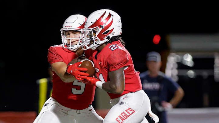Milton running back TJ Lester (21) added 143 yards and two touchdowns to his 2024 rushing totals last Friday. He is a candidate for this week's North Georgia high school football Player of the Week.