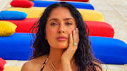 Salma Hayek Pinault was photographed by Ruven Afanador in Mexico. Swimsuit by Sommer Swim. Necklace by Jacquie Aiche.