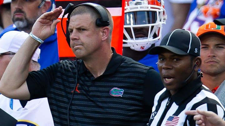 Florida Gators head coach Billy Napier coaches from the sideline during the season opener at Ben Hill Griffin Stadium in Gainesville, FL on Saturday, August 31, 2024 against the University of Miami Hurricanes in the first half. Miami lead 24-10 at the half. [Doug Engle/Gainesville Sun]