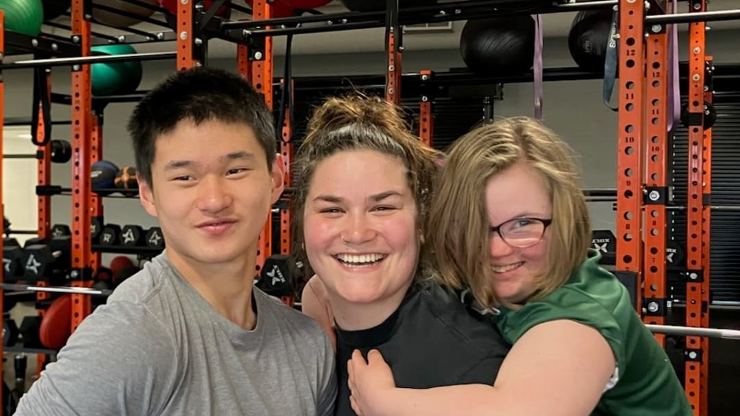Coach Britta Hesselberg with two of her athletes