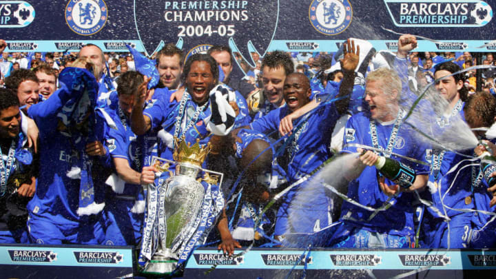 Chelsea players spray champagne over the