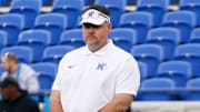 Memphis offensive coordinator Tim Cramsey watches the offense warm up prior to the game between Memphis and Tulane at Simmons Bank Liberty Stadium in Memphis, Tenn.