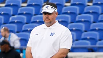 Memphis offensive coordinator Tim Cramsey watches the offense warm up prior to the game between Memphis and Tulane at Simmons Bank Liberty Stadium in Memphis, Tenn.