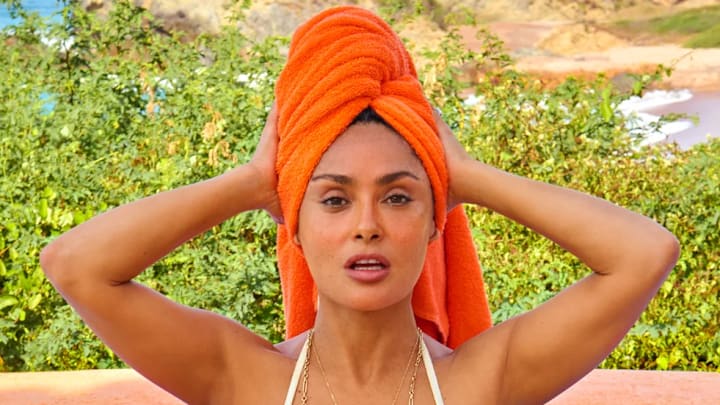 Salma Hayek Pinault was photographed by Ruven Afanador in Mexico. Swimsuit by TJ Swim. Necklace by Foundrae. Salma Hayek Pinault was photographed by Ruven Afanador in Mexico. Swimsuit by TJ Swim. Necklace by Foundrae.