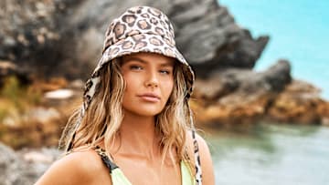 Ellie Thumann was photographed by Ben Watts in Bermuda. Hat by Eugenia Kim.