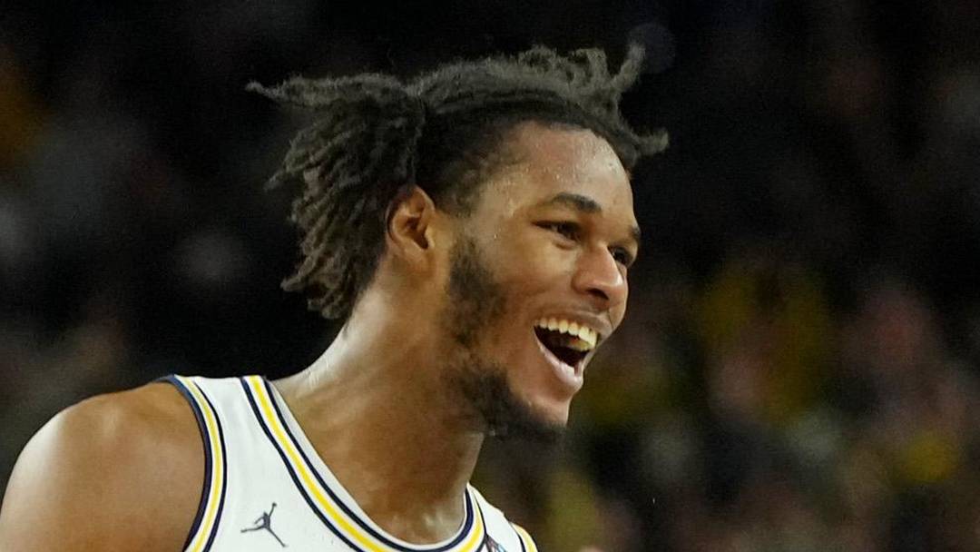 Apr 6, 2026; Indianapolis, IN, USA; Michigan Wolverines forward Morez Johnson Jr. (21) and guard Nimari Burnett (4) celebrate after their win against the UConn Huskies in the national championship of the Final Four of the men's 2026 NCAA Tournament between the and the Michigan Wolverines at Lucas Oil Stadium. Mandatory Credit: Bob Donnan-Imagn Images Apr 6, 2026; Indianapolis, IN, USA; Michigan Wolverines forward Morez Johnson Jr. (21) and guard Nimari Burnett (4) celebrate after their win against the UConn Huskies in the national championship of the Final Four of the men's 2026 NCAA Tournament between the and the Michigan Wolverines at Lucas Oil Stadium. Mandatory Credit: Bob Donnan-Imagn Images