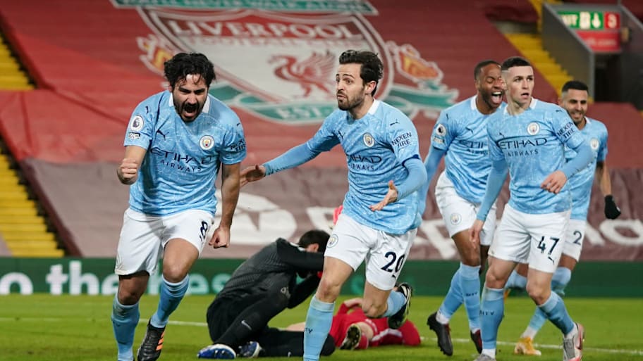 Man City celebrate at Anfield