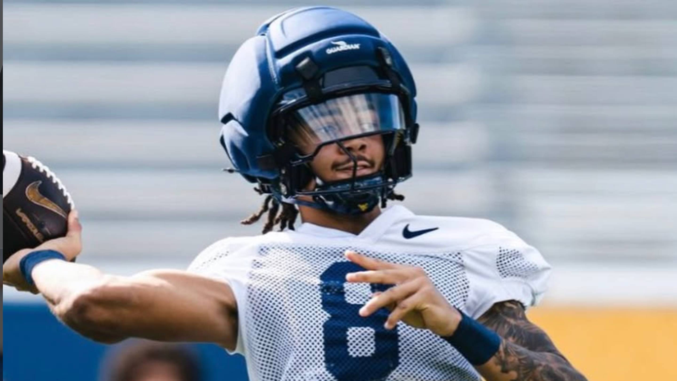 WVU Freshman QB Could Be 'Pretty Scary to Defend,' Says Rhett Rodriguez