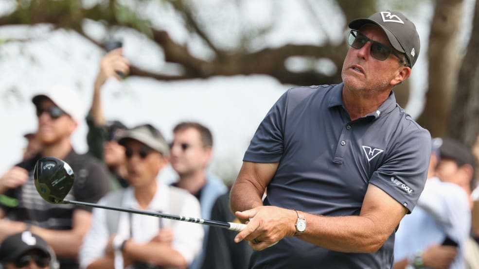 Phil Mickelson watches a shot at LIV Golf Hong Kong.