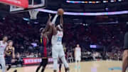 Jimmy Butler tried to block Bam Adebayo.