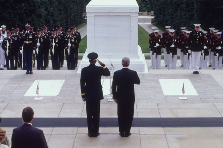 President Bill Clinton laying a wreath at the Tomb of the Unknown Soldier, 1993. 
