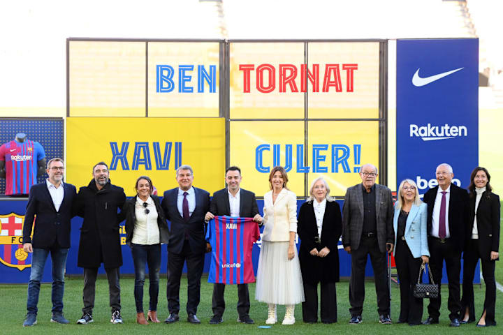 Xavi Hernandez, Joan Laporta, Nuria Cunillera