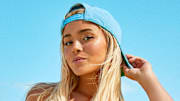 Olivia Dunne was photographed by Ben Watts in Bermuda. Hat by ’47.