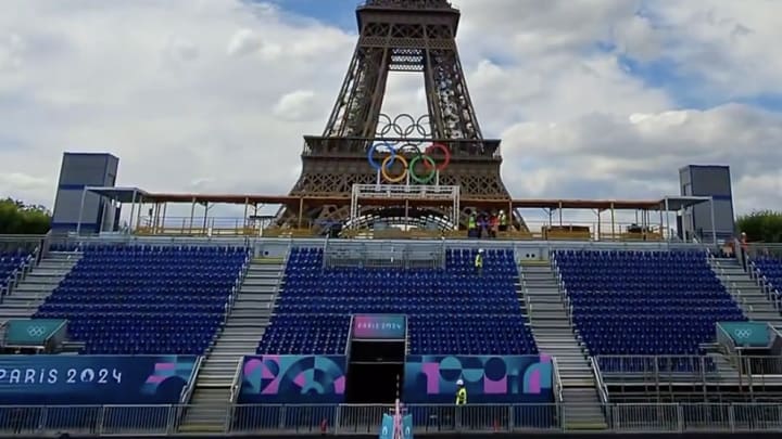The Eiffel Tower overlooks the Olympic beach volleyball venue.