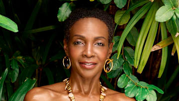 Roshumba Williams was photographed by Yu Tsai in Jamaica. Swimsuit by Johanna Ortiz. Earrings by Ben-Amun. Necklace by Presley Oldham. 