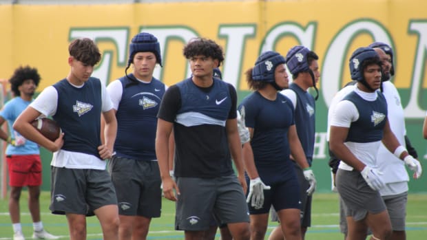 St. John Bosco QB (center, black undershirt) Matai Fuiava during the Battle at the Beach passing tournament at Edison High.