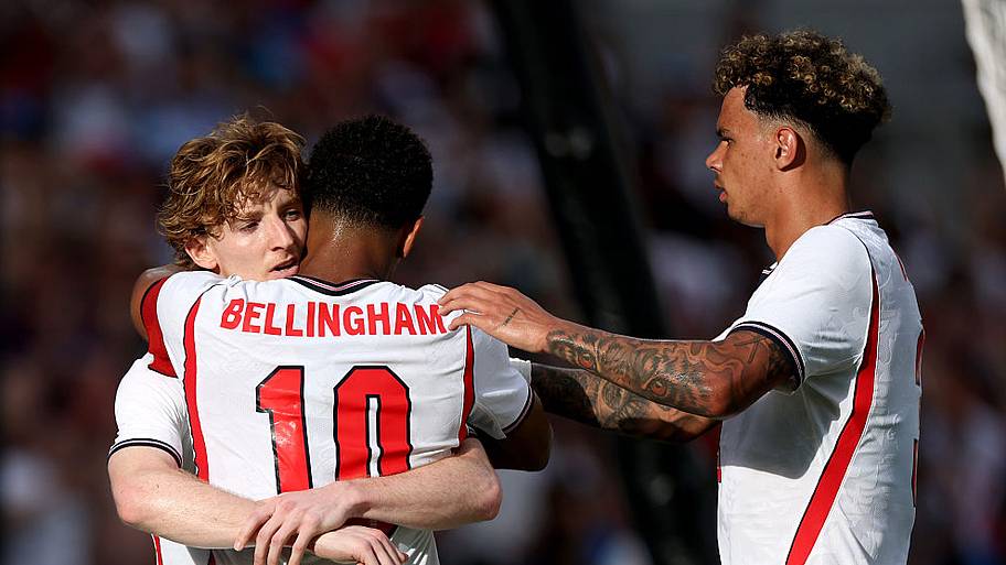 Anthony Gordon, Jude Bellingham and Nico O’Reilly celebrate for England.