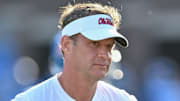 Ole Miss Rebels coach Lane Kiffin during pregame warmups before a game against the Arkansas Razorbacks at Vaught-Hemingway Stadium in Oxford, Miss.