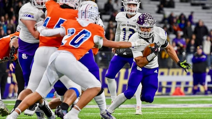 Jayshon Limar takes a carry for Lake Stevens in WIAA Class 4A championship game victory over Graham Kapowsin in 2023.