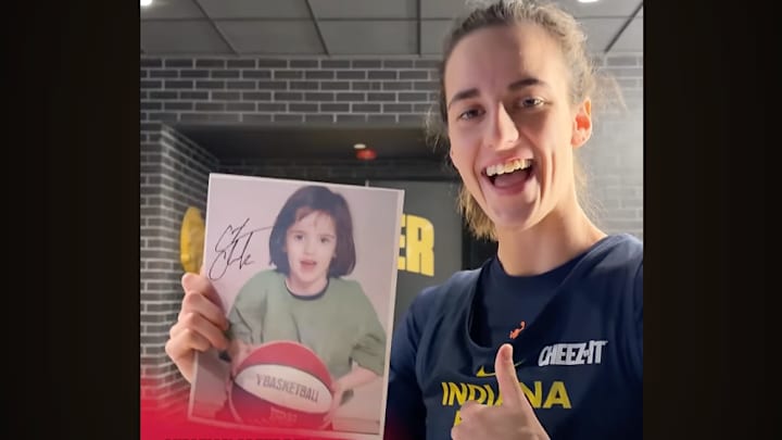 Caitlin Clark autographed a picture of her younger self.