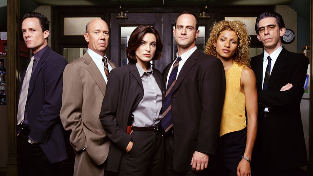 LAW & ORDER: SPECIAL VICTIMS UNIT -- Season 1 -- Pictured: (l-r) Dean Winters as Detective Brian Cassidy, Dann Florek as Captain Donald Cragen, Mariska Hargitay as Detective Olivia Benson, Christopher Meloni as Detective Elliot Stabler, Michelle Hurd as Detective Monique Jefferies, Richard Belzer as Detective John Munch 