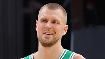 Kristaps Porzingis #8 of the Boston Celtics reacts against the Atlanta Hawks.