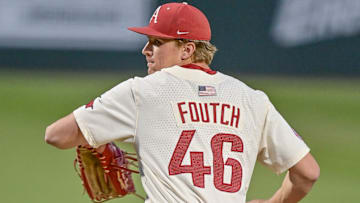 Arkansas Razorbacks pitcher Christian Foutch winds up to throw a pitch against the UCA Bears at Baum-Walker Stadium in Fayetteville, Ark.