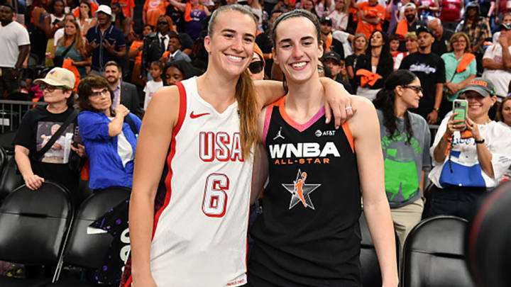 Sabrina Ionescu and Caitlin Clark take a photo together after the 2024 WNBA All-Star Game at Footprint Center.