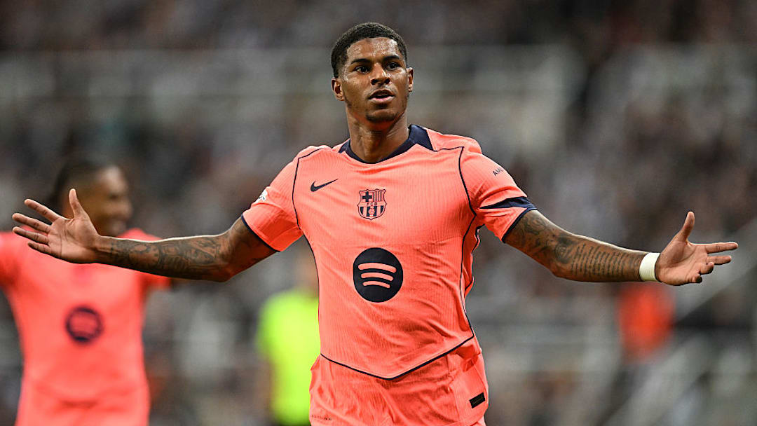 Marcus Rashford celebrates his second strike for Barcelona in this statement win.