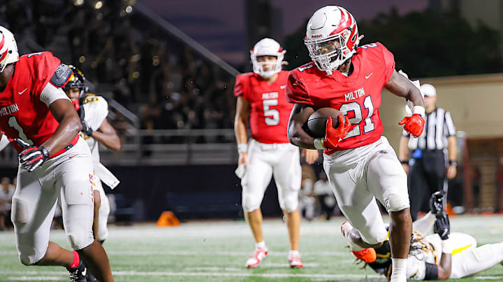 Milton running back TJ Lester running against American Heritage 