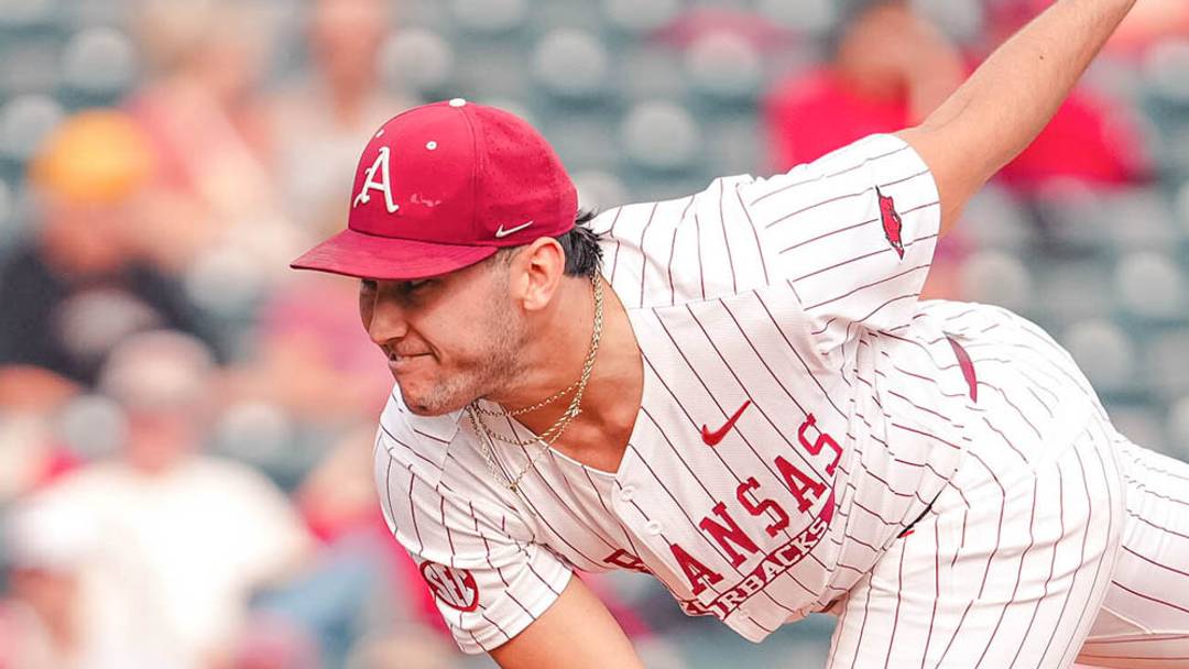Arkansas Razorbacks pitcher James DeCremer throwing against Arkansas State. Arkansas Razorbacks pitcher James DeCremer throwing against Arkansas State.
