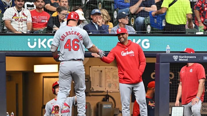 Sep 3, 2024; Milwaukee, Wisconsin, USA; St. Louis Cardinals first base Paul Goldschmidt (46) is congraulated by St. Louis Cardinals manager Oliver Marmol (37) after hitting a home run against the Milwaukee Brewers in the fourth inning at American Family Field. Mandatory Credit: Michael McLoone-Imagn Images Sep 3, 2024; Milwaukee, Wisconsin, USA; St. Louis Cardinals first base Paul Goldschmidt (46) is congraulated by St. Louis Cardinals manager Oliver Marmol (37) after hitting a home run against the Milwaukee Brewers in the fourth inning at American Family Field. Mandatory Credit: Michael McLoone-Imagn Images