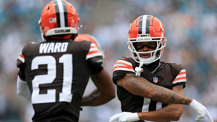 Cleveland Browns cornerback Greg Newsome II (0) reacts with cornerback Denzel Ward (21) on a third down stop during the first quarter of an NFL football matchup Sunday, Sept. 15, 2024 at EverBank Stadium in Jacksonville, Fla. The Browns defeated the Jaguars 18-13. [Corey Perrine/Florida Times-Union]