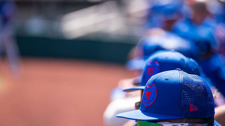 Mar 18, 2023; Scottsdale, Arizona, USA;  A general view hats belonging to Chicago Cubs players in the dugout during the first inning during a spring training game against the San Fracisco Giants at Scottsdale Stadium. Mandatory Credit: Allan Henry-Imagn Images.