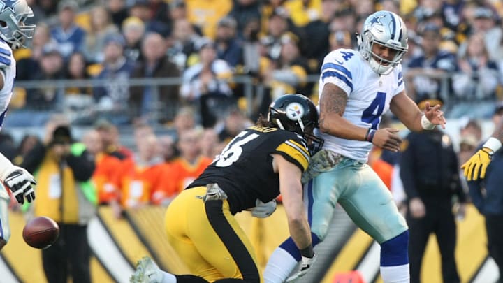 Dallas Cowboys quarterback Dak Prescott is stripped of the ball by Pittsburgh Steelers linebacker Anthony Chickillo.