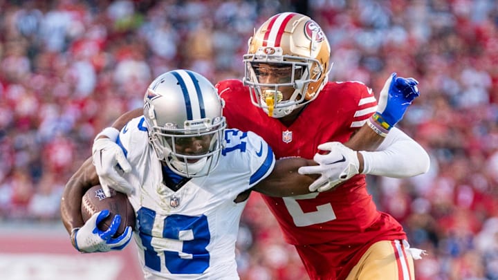 October 8, 2023; Santa Clara, California, USA; San Francisco 49ers cornerback Deommodore Lenoir (2) tackles Dallas Cowboys wide receiver Michael Gallup (13) during the second quarter at Levi's Stadium. October 8, 2023; Santa Clara, California, USA; San Francisco 49ers cornerback Deommodore Lenoir (2) tackles Dallas Cowboys wide receiver Michael Gallup (13) during the second quarter at Levi's Stadium.