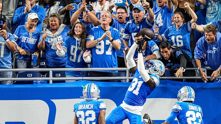 Detroit Lions safety Kerby Joseph (31) celebrates an interception against Los Angeles Rams during the first half at Ford Field in Detroit on Sunday, September 8, 2024.