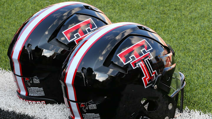 Sep 21, 2024; Lubbock, Texas, USA;  A general view of Texas Tech Red Raiders helmets on the turf before the game between the Arizona State Sun Devils and the Texas Tech Red Raiders at Jones AT&T Stadium and Cody Campbell Field. Mandatory Credit: Michael C. Johnson-Imagn Images