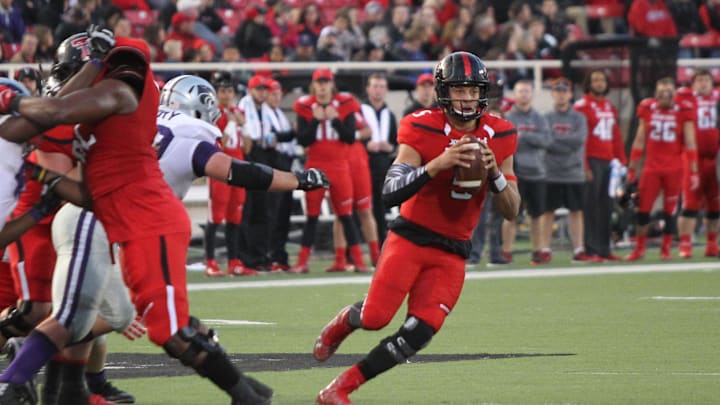Nov 14, 2015; Lubbock, TX, USA; Texas Tech Red Raiders quarterback Patrick Mahomes (5) prepares to throw the ball against the Kansas State Wildcats in the second half at Jones AT&T Stadium. The Red Raiders won 59-44.  Mandatory Credit: Michael C. Johnson-Imagn Images