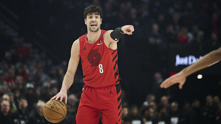 Feb 6, 2025; Portland, Oregon, USA;  Portland Trail Blazers forward Deni Avdija (8) calls out a play the ball during the first half against the Sacramento Kings at Moda Center. Mandatory Credit: Troy Wayrynen-Imagn Images