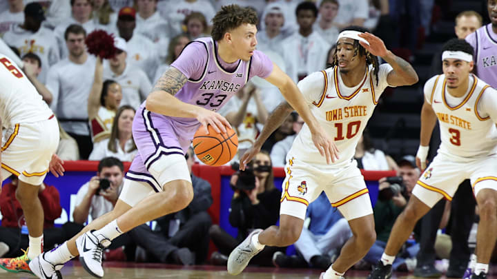 Feb 1, 2025; Ames, Iowa, USA; Iowa State Cyclones guard Keshon Gilbert (10) defends Kansas State Wildcats guard Coleman Hawkins (33) during the first half at James H. Hilton Coliseum. Mandatory Credit: Reese Strickland-Imagn Images