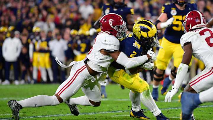 Jan 1, 2024; Pasadena, CA, USA; Michigan Wolverines running back Blake Corum (2) runs against Jan 1, 2024; Pasadena, CA, USA; Michigan Wolverines running back Blake Corum (2) runs against
