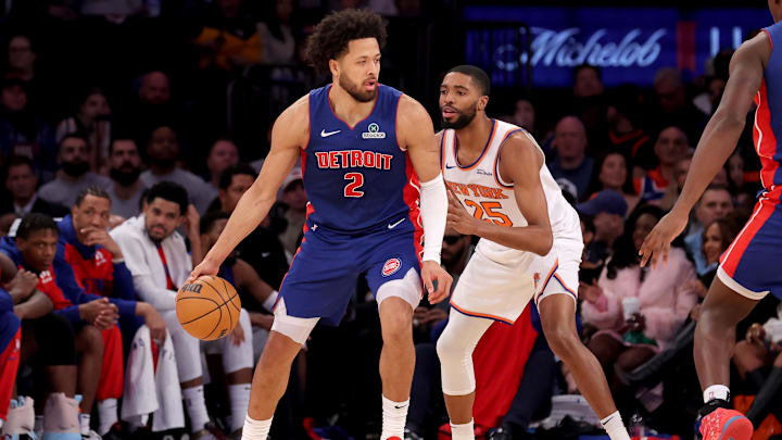 Jan 13, 2025; New York, New York, USA; Detroit Pistons guard Cade Cunningham (2) controls the ball against New York Knicks forward Mikal Bridges (25) during the second quarter at Madison Square Garden. Mandatory Credit: Brad Penner-Imagn Images