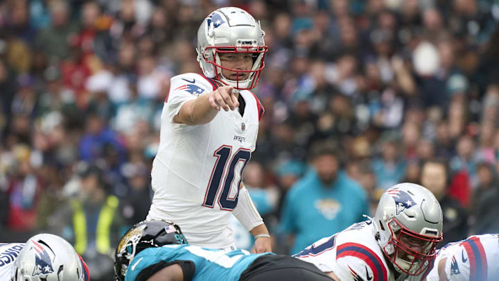 Oct 20, 2024; London, United Kingdom; New England Patriots quarterback Drake Maye (10) in the first half during an NFL International Series game at Wembley Stadium. Mandatory Credit: Peter van den Berg-Imagn Images