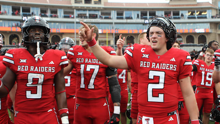 Sep 21, 2024; Lubbock, Texas, USA;  Texas Tech Red Raiders tight end Johncarlos Miller II (9) and quarterback Behren Morton (2) after the game against the Arizona State Sun Devils at Jones AT&T Stadium and Cody Campbell Field. Mandatory Credit: Michael C. Johnson-Imagn Images