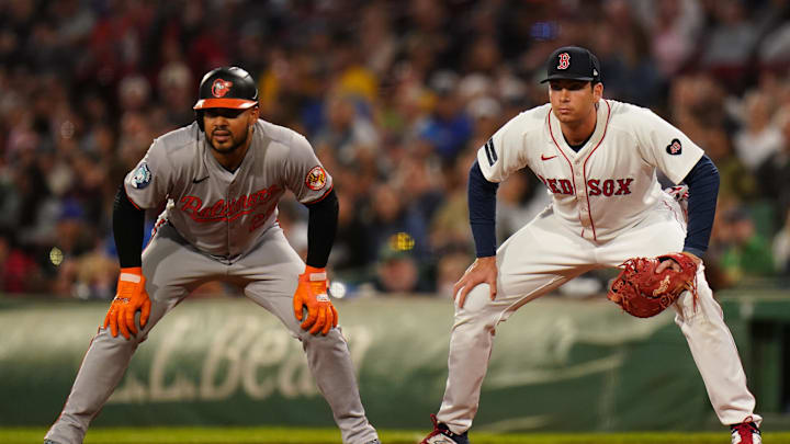 Sep 11, 2024; Boston, Massachusetts, USA; Baltimore Orioles designated hitter Anthony Santander (25) at first base with Boston Red Sox first baseman Triston Casas (36) in the first inning at Fenway Park. Mandatory Credit: David Butler II-Imagn Images