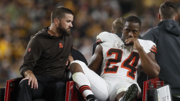 Sep 18, 2023; Pittsburgh, Pennsylvania, USA;  Cleveland Browns running back Nick Chubb (24) is taken from the field on a cart after suffering an apparent injury against the Pittsburgh Steelers during the second quarter at Acrisure Stadium. Mandatory Credit: Charles LeClaire-USA TODAY Sports