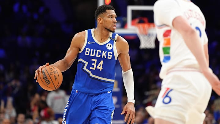 Milwaukee Bucks forward Antetokounmpo controls the ball against the Philadelphia 76ers in the second quarter at Wells Fargo Center. 